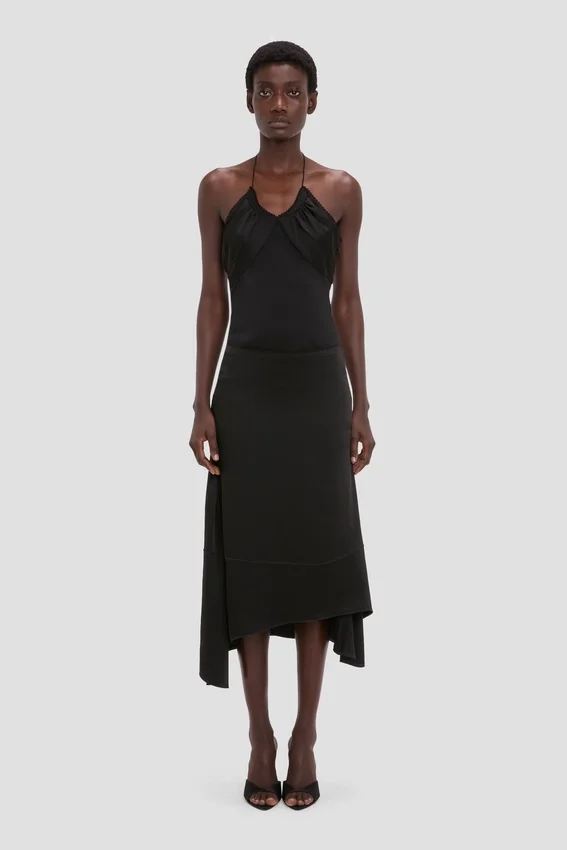 Asymmetrischer Midirock in Schwarz Asymmetrischer Midirock in Schwarz