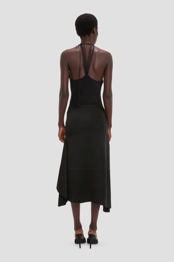 Asymmetrischer Midirock in Schwarz Asymmetrischer Midirock in Schwarz