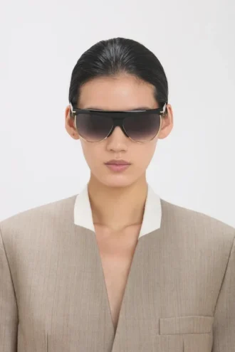 Geformte Sonnenbrille aus Metall und Acetat mit flachem Oberteil